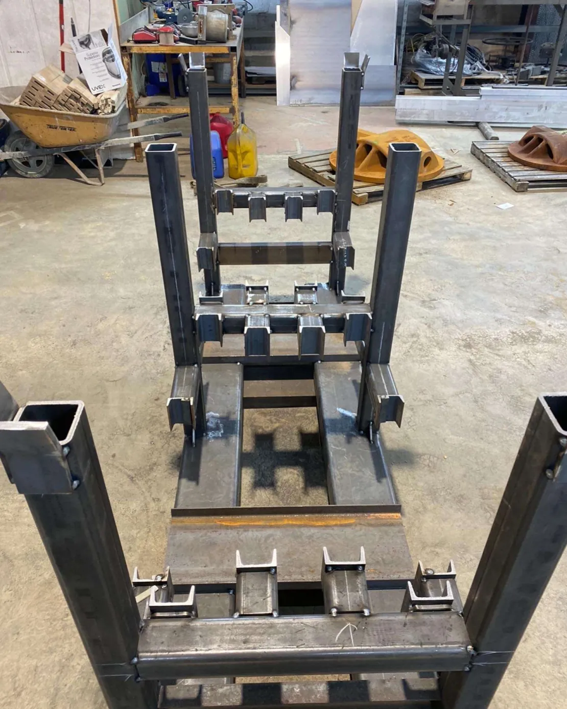 Custom steel fabrication jig and mounting bracket - custom metal fabrication near me