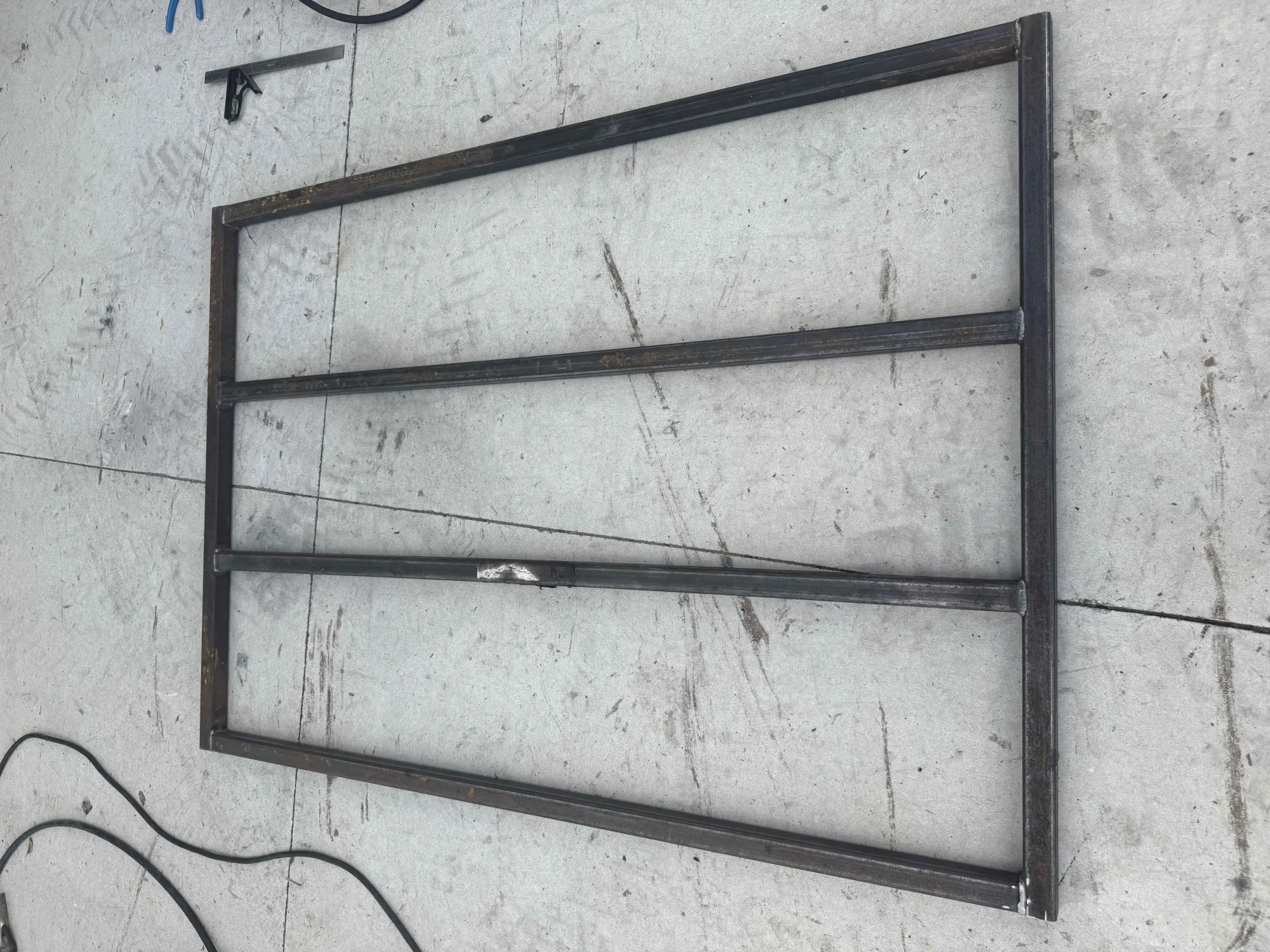 Steel tubing frame fabrication with cross bars - steel fabrication near me